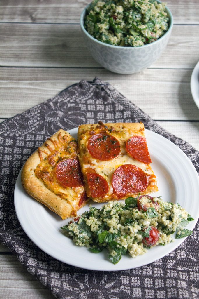 Chopped Spinach and Quinoa Goat Cheese Caesar Salad -- The perfect pizza accompaniment | wearenotmartha.com