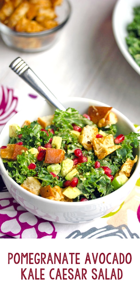 Pomegranate Avocado Kale Caesar Salad -- Caesar salads are nice, but they're even better when made with kale and avocado. This Pomegranate Avocado Kale Caesar Salad with parmesan croutons is the most delicious side or entree salad! | wearenotmartha.com #caesarsalad #kale #kalesalad #pomegranate #avocados #salads