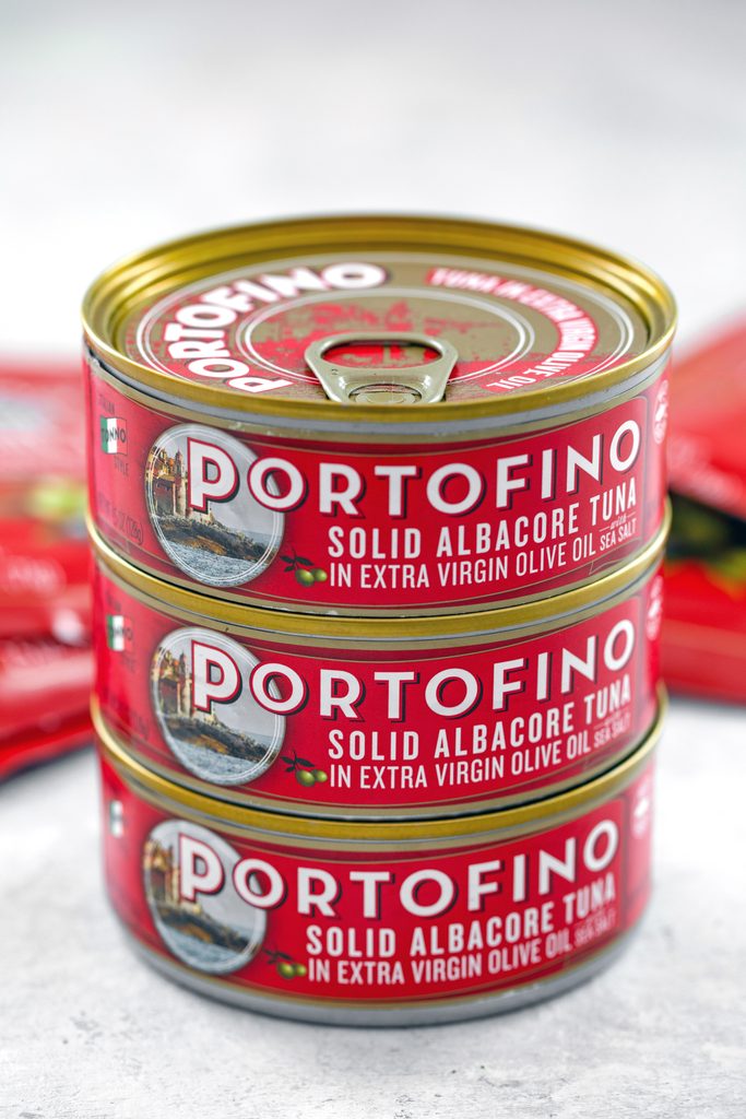 Head-on view of three cans of Portofino Tuna stacked on each other