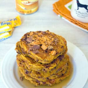 Pumpkin Butterfinger Pancakes -- Who says you can't eat candy for breakfast? These Pumpkin Butterfinger Pancakes combine two of fall's best flavors... Pumpkin and Halloween candy! | wearenotmartha.com