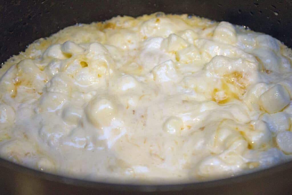 marshmallows melting with butter in saucepan