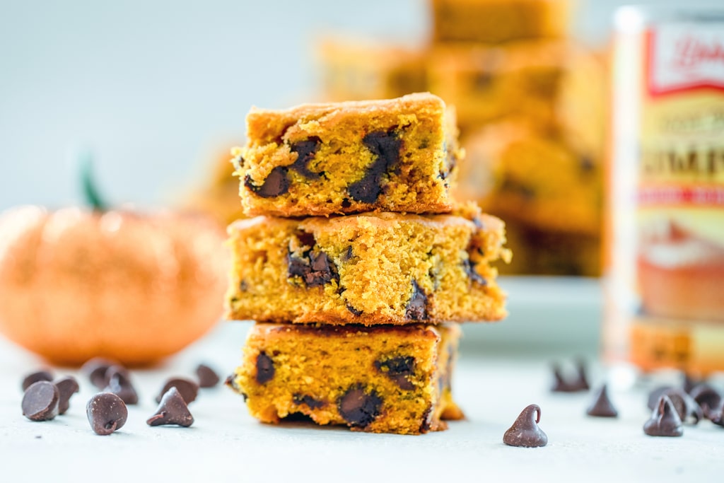 Pumpkin Chocolate Chip Squares -- If you're looking for a go-to pumpkin recipe you'll make over and over, these pumpkin chocolate chip squares are it. I have yet to met a person who doesn't rave about these pumpkin bars every time I make them! | wearenotmartha.com