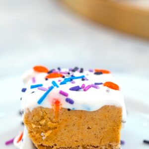 Pumpkin Cookie Dough Bars -- If you can stop yourself from eating the pumpkin cookie dough right out of the bowl, make these No-Bake Pumpkin Cookie Dough Bars with a graham cracker crust and marshmallow topping. They'll make your fall dreams come true | wearenotmartha.com