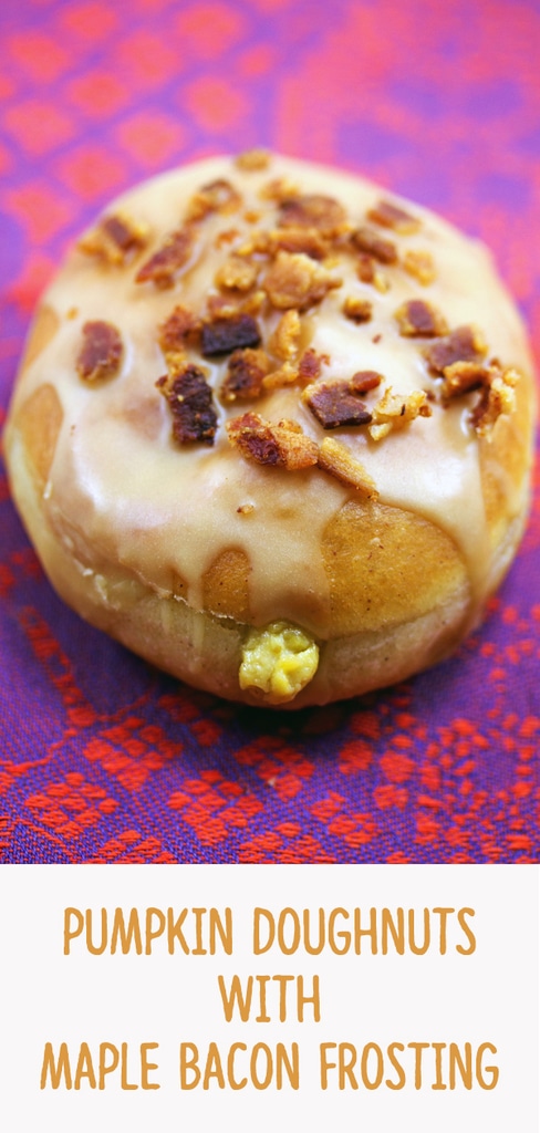 Pumpkin Doughnuts with Maple Bacon Frosting -- If you're going to make pumpkin doughnuts, you may as well go all out with these pumpkin doughnuts filled with pumpkin custard and topped with maple bacon frosting | wearenotmartha.com