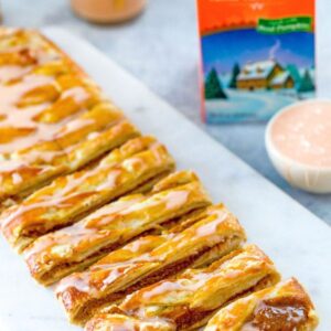 Pumpkin Eggnog Danish -- This Pumpkin Eggnog Danish is a deliciously easy holiday brunch dish packed with a pumpkin eggnog and cream cheese filling made with Hood Pumpkin Eggnog | wearenotmartha.com