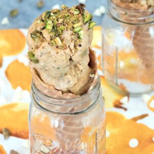 Pumpkin Ice Cream with Pistachio Swirl -- A fall themed ice cream packed with pumpkin, pistachios, and white chocolate chips | wearenotmartha.com