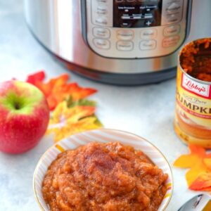 Pumpkin Pie Applesauce {in the Instant Pot} -- You don't have to decide between apples and pumpkins this fall! Enjoy them together with this Pumpkin Pie Applesauce made in the Instant Pot! It's the easiest and quickest applesauce ever, but if you don't have a pressure cooker, it can also be made in a slow cooker or on the stovetop | wearenotmartha.com