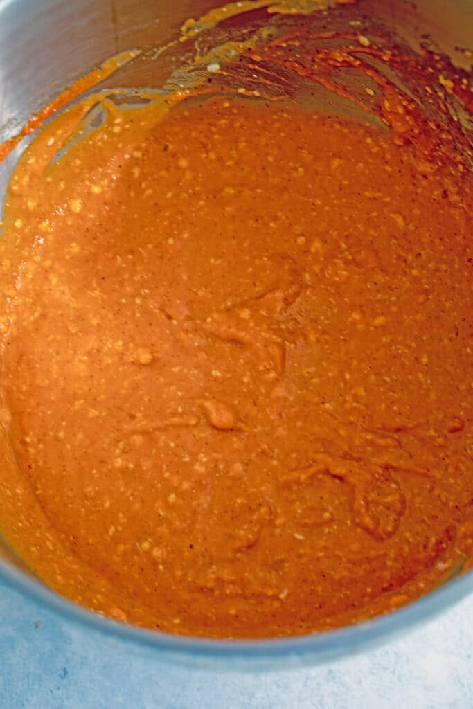 Pumpkin pie filling in mixing bowl