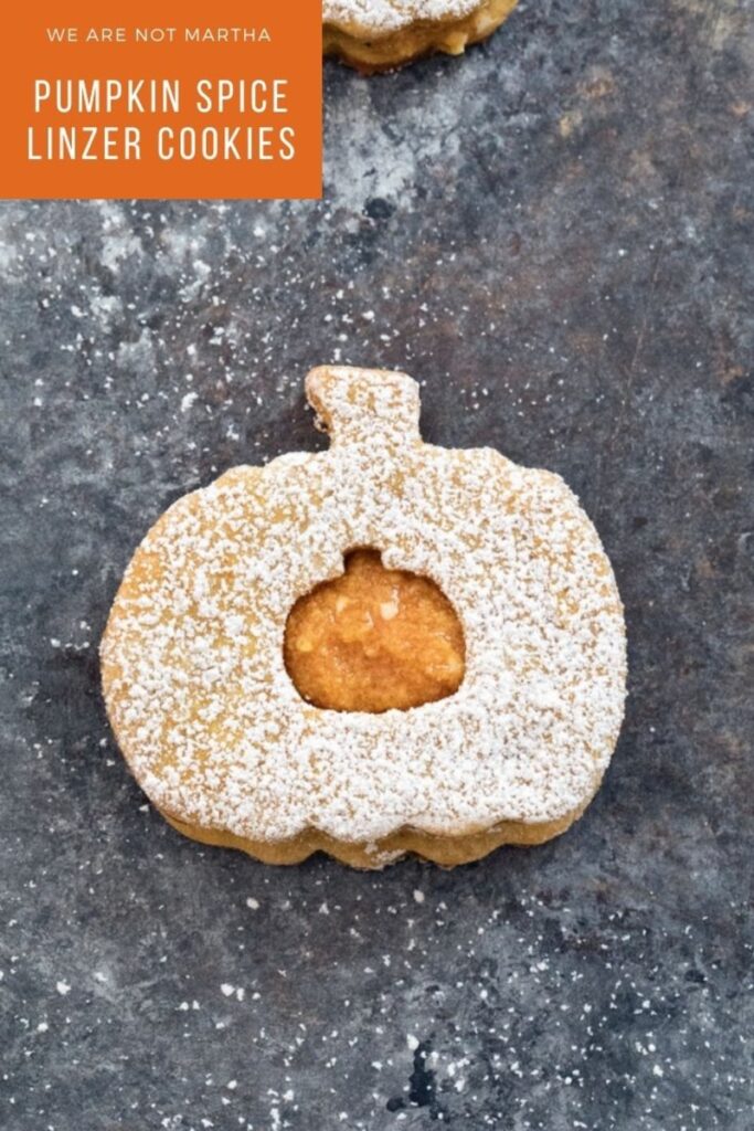 Pumpkin Spice Linzer Cookies are delicious pumpkin sandwich cookies filled with pumpkin cinnamon buttercream | wearenotmartha.com #pumpkinspice #linzercookies #fallcookies #pumpkincookies