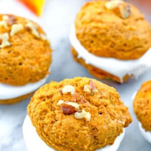 Pumpkin Whoopie Pies -- Sweet and tangy marshmallow cream sandwiched between light and fluffy pumpkin cookies. These Pumpkin Whoopie Pies are the perfect fall dessert! | wearenotmartha.com