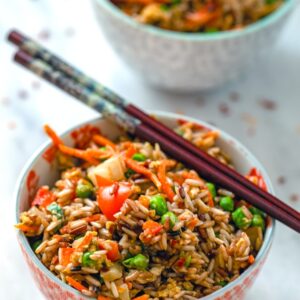 Quick Vegetable Fried Brown Rice -- Looking for a quick and easy healthy dinner that's also delicious? This Quick Vegetable Fried Brown Rice is packed with veggies and whole grains and is the perfect weeknight meal | wearenotmartha.com