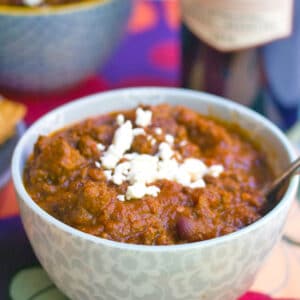 Red Wine Pumpkin Chili -- When there's a chill in the air, there should be chili in your bowl. This Red Wine Pumpkin Chili is the ultimate comfort food made with ground beef and chipotle peppers. Serve with homemade chili lime tortilla chips for a meal that will warm you up! | wearenotmartha.com