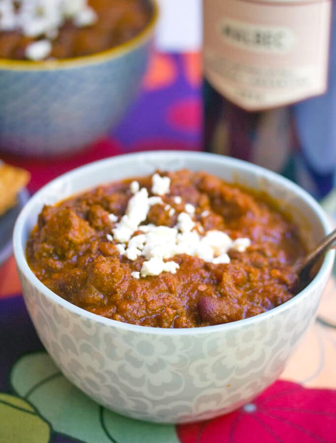 Red Wine Pumpkin Chili -- When there's a chill in the air, there should be chili in your bowl. This Red Wine Pumpkin Chili is the ultimate comfort food made with ground beef and chipotle peppers. Serve with homemade chili lime tortilla chips for a meal that will warm you up! | wearenotmartha.com