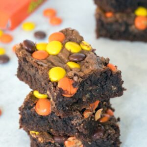 Reese's Pieces Peanut Buttery Brownies -- These brownies are packed with peanut butter, chocolate, Reese's Peanut Butter Cups, and Reese's Pieces. Peanut butter lovers, rejoice! | wearenotmartha.com