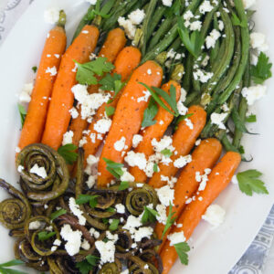 Roasted Fiddleheads, Carrots, Haricot Vert -- A vegetable side dish topped with feta | wearenotmartha.comRoasted Fiddleheads, Carrots, Haricot Vert -- A vegetable side dish topped with feta | wearenotmartha.com