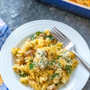 Roasted Garlic Mac and Cheese with Sausage and Kale -- If you're looking to take the typical mac and cheese up a few levels, try this Roasted Garlic Mac and Cheese with Sausage and Kale. With two types of cheese, lots of sausage, roasted garlic, and fresh kale, this mac and cheese is the ultimate comfort food! | wearenotmartha.com #macandcheese #roastedgarlic #sausage #comfortfood