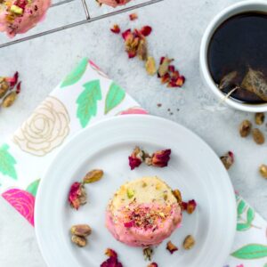 Rose Pistachio Shortbread Cookies -- These cookies take the best ever shortbread cookie recipe and add a fresh twist with crushed pistachio nuts and a pink rose petal icing | wearenotmartha.com