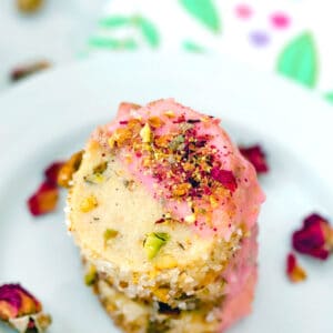 Rose Pistachio Shortbread Cookies -- These cookies take the best ever shortbread cookie recipe and add a fresh twist with crushed pistachio nuts and a pink rose petal icing | wearenotmartha.com