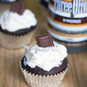 S'mores Vodka Cupcakes -- It doesn't get any more delicious than these S'mores Vodka Cupcakes, which involve s'mores vodka in both the cake and the frosting... Plus, they have a marshmallow fluff center | wearenotmartha.com
