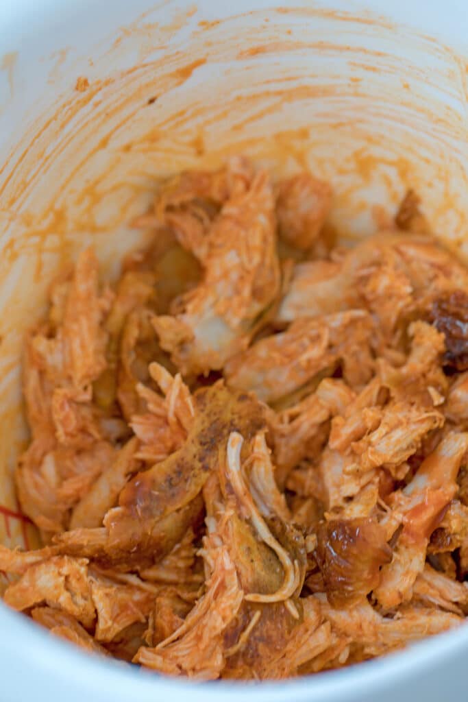 Shredded chicken with hot sauce.