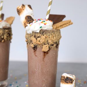 Bourbon S'mores Milkshake -- toasted marshmallows, chocolate ice cream, graham crackers, and bourbon all blended together for an alcoholic treat | wearenotmartha.com