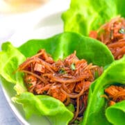 These Spicy Asian Lettuce Wraps are made with chicken, noodles, and a deliciously spicy sauce and are packed with flavor. They make for an easy weeknight dinner!
