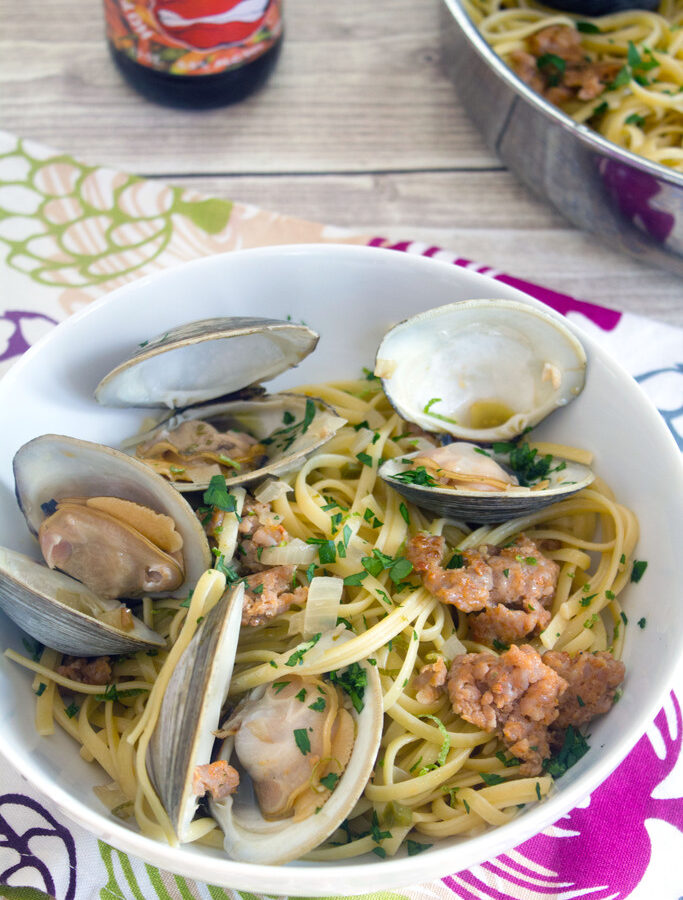 Spicy Lime Linguine with Clams and Sausage -- Linguine with Clams and a spicy twist... The secret ingredients in this meal favorite are spicy sausage, lime juice, and a hot pepper hard cider | wearenotmartha.com