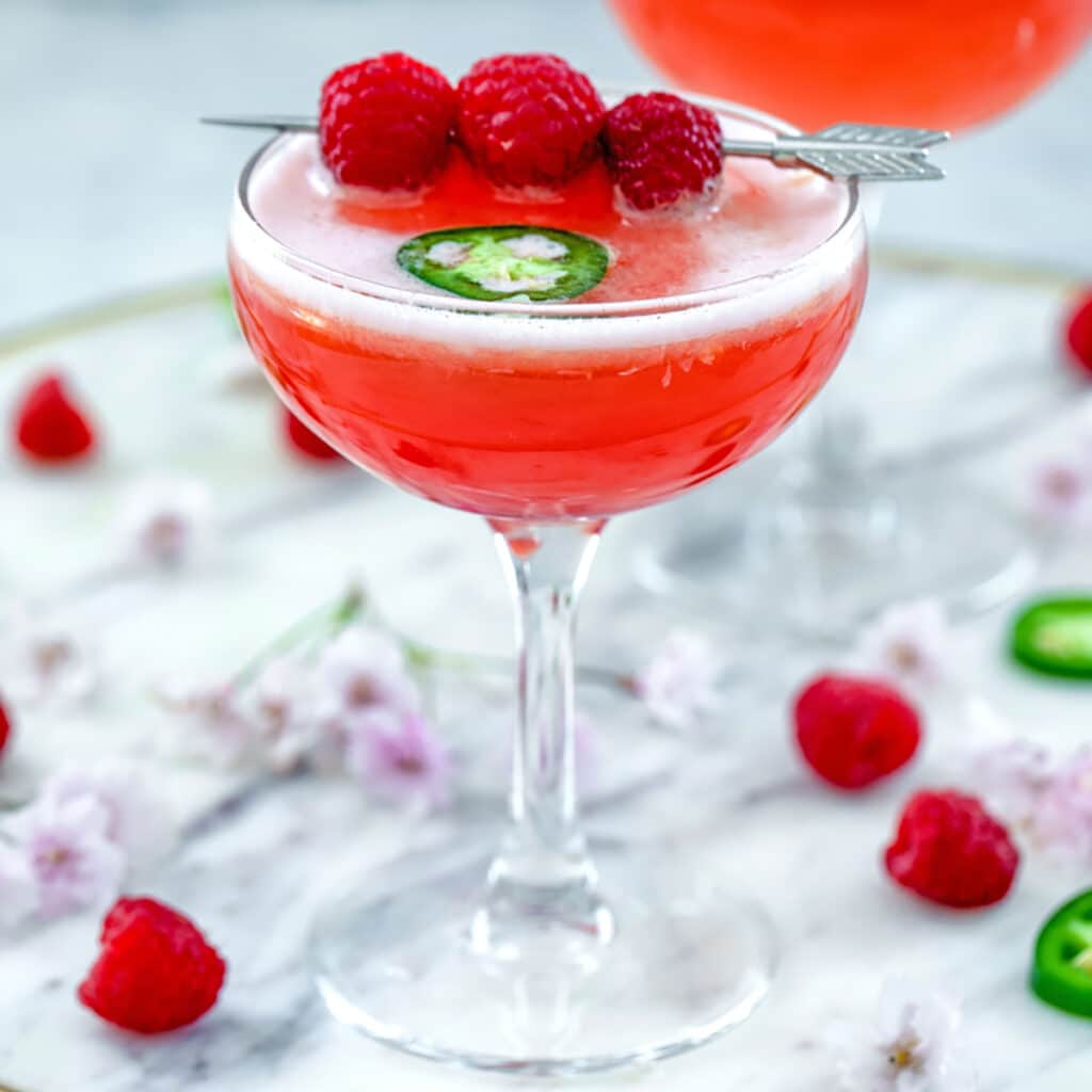 Spicy Raspberry Whiskey Sour Recipe | We are not Martha