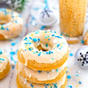 Spiked Eggnog Doughnuts -- These Spiked Eggnog Doughnuts are packed with festive eggnog flavor and just a touch of rum (you can leave out the rum if you want!). They're incredibly moist baked doughnuts perfect for celebrating the holiday season! | wearenotmartha.com