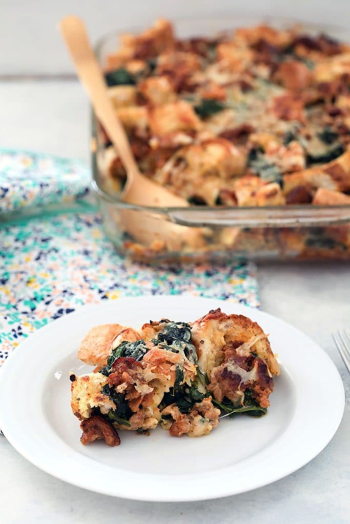 Spinach, Sausage, and Cheese Strata -- Looking for a make-ahead dish you can serve at a brunch party? This Spinach, Sausage, and Cheese Strata can be prepped the day before so all you have to do in the morning is pop it in the oven | wearenotmartha.com