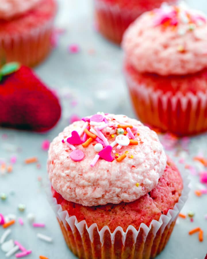 Sprinkles Strawberry Cupcakes -- These strawberry cupcakes are based off the Sprinkles Strawberry Cupcakes recipe and with fresh strawberries in both the cake and the frosting, they're packed with fruity flavor | wearenotmartha.com