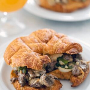Steak and Cheese Croissants -- There are a few important components necessary for the perfect steak and cheese sandwich. These hit all the marks and make for the ultimate lunch or dinner | wearenotmartha.com