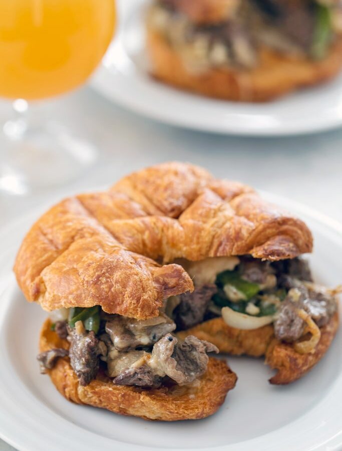 Steak and Cheese Croissants -- There are a few important components necessary for the perfect steak and cheese sandwich. These hit all the marks and make for the ultimate lunch or dinner | wearenotmartha.com