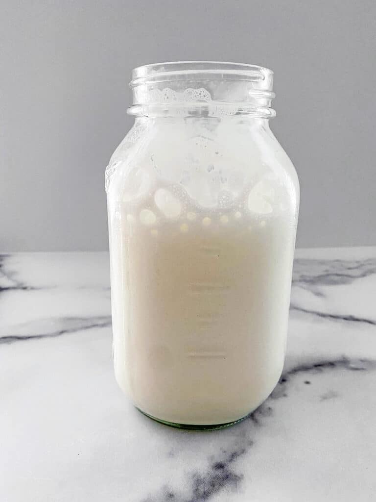 Milk in mason jar after being shook.