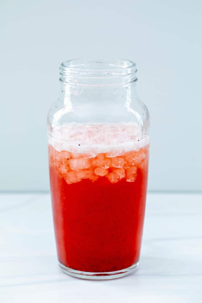 Strawberry Acai Refresher in ice-filled shaker.