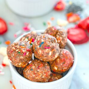 Strawberry Funfetti Energy Bites -- Delicious, healthy, and packed with energy-boosting properties, these Strawberry Funfetti Energy Bites will get you through those mid-afternoon energy slumps | wearenotmartha.com