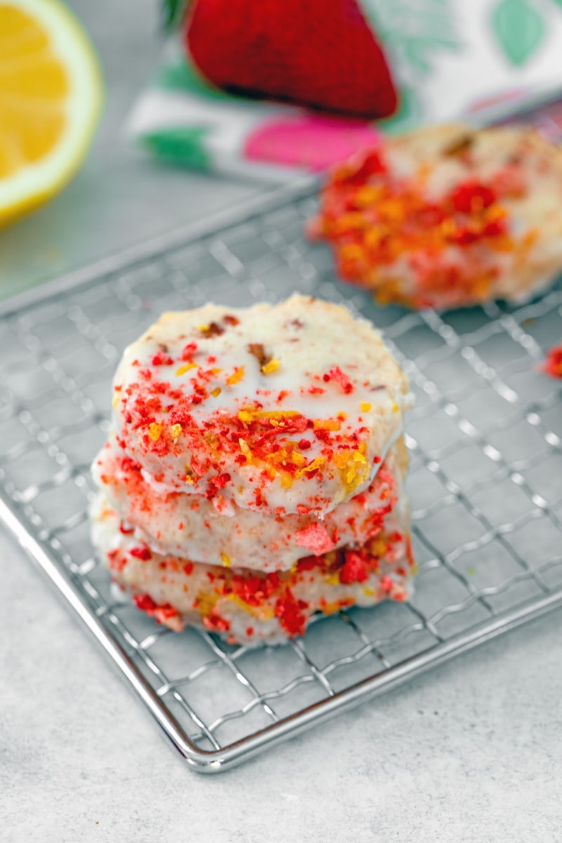 Strawberry Lemonade Shortbread Cookies -- These Strawberry Lemonade Shortbread Cookies are like little bursts of sunshine and are the ultimate summer cookies. Plus, they're incredibly easy to make | wearenotmartha.com