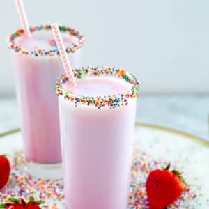 Fresh Strawberry Milk -- This is nothing like the store-bought strawberry milk you had as a kid. Fresh Strawberry Milk is made with a homemade strawberry syrup and the milk or dairy alternative of your choice and is packed with strawberry flavor! | wearenotmartha.com