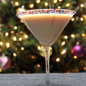 Sugar Cookie Martini -- This holiday cocktail is seriously festive and sweet. Serve these Sugar Cookie Martinis at your next holiday party or at home by the Christmas tree| wearenotmartha.com