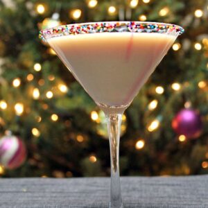 Sugar Cookie Martini -- This holiday cocktail is seriously festive and sweet. Serve your guests a Sugar Cookie Martini at your next holiday party or at home by the Christmas tree | wearenotmartha.com