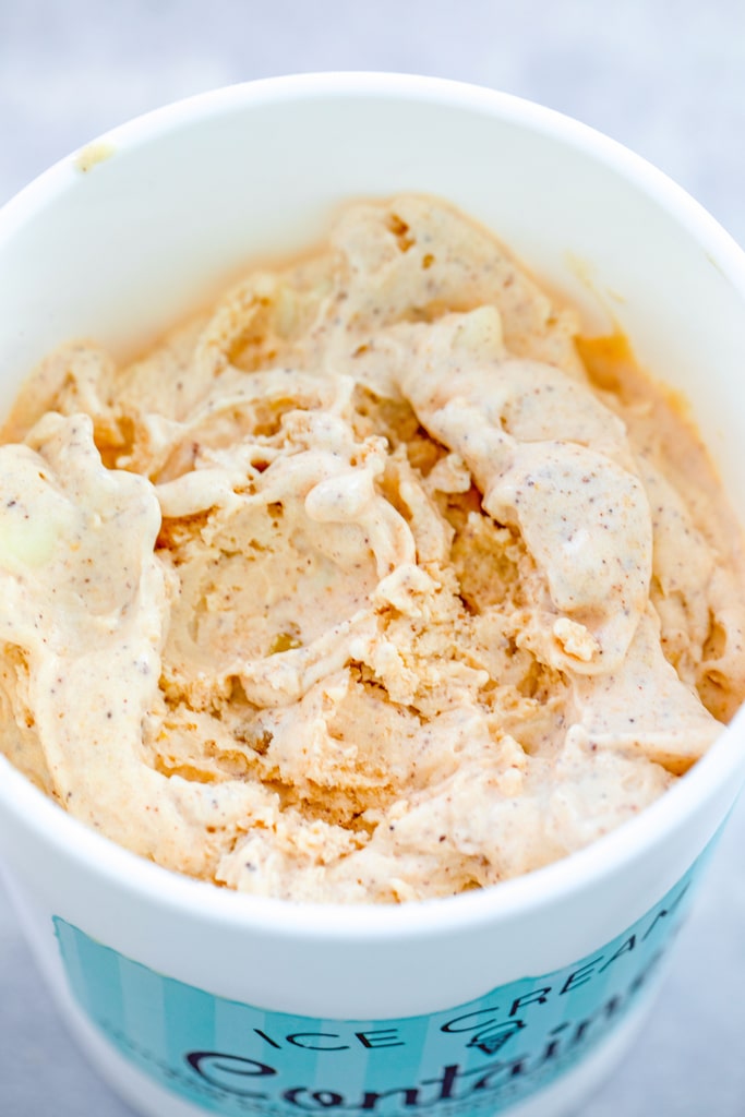 Overhead view of sweet potato ice cream in quart ice cream container ready to be eaten