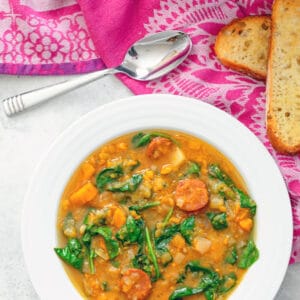 Sweet Potato and Sausage Soup -- This Sweet Potato and Sausage Soup is chock full of sweet potatoes, white potatoes, and chorizo, making it a ridiculously satisfying meal perfect for chilly evenings | wearenotmartha.com