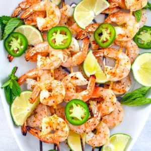 Tequila Jalapeño Shrimp -- Looking for an easy summer appetizer packed with flavor? This grilled tequila shrimp is quick-to-make and a light appetizer your guests will love | wearenotmartha.com
