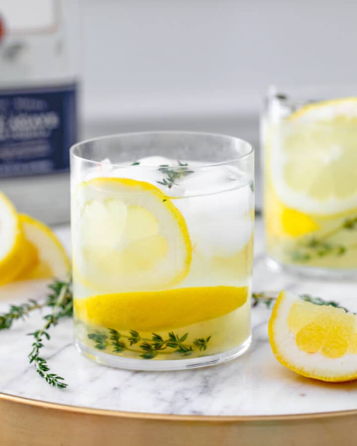 This Tequila Thyme Lemonade is a super simple summer cocktail made with homemade lemonade and fresh thyme. It's light and refreshing and perfect for enjoying in the sunshine!