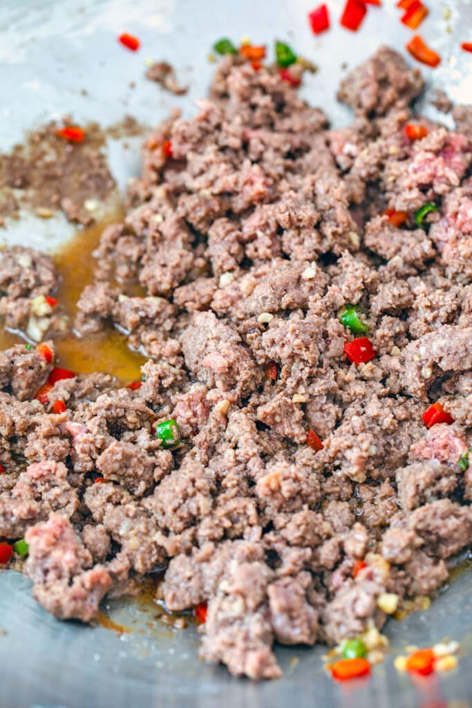 Ground beef cooked in wok with spicy Thai peppers and minced garlic.