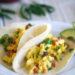 Thai Scrambled Egg Tacos -- These Thai Scrambled Egg Tacos take creamy scrambled eggs packed with spicy Thai flavors and serve them on tortillas for a breakfast you'll dream about | wearenotmartha.com