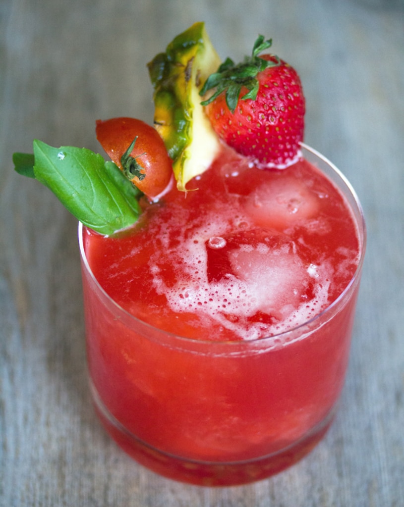 Tomato Campari Cocktail -- This Tomato Campari Cocktail is the most gorgeous shade of red and is refreshingly delicious. Who would have thought tomatoes, fruit, and Campari would go so well together? | wearenotmartha.com