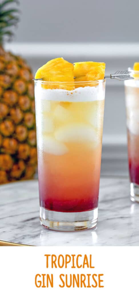Tropical Gin Sunrise -- Tropical Gin Sunrise cocktails are a visually stunning combination of pineapple juice, gin, raspberry lambic and lemon juice. They're easy to mix and perfect for summer sipping! | wearenotmartha.com #gin #cocktails #tropicaldrinks #gindrinks