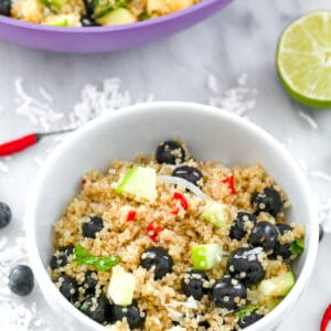 Tropical Quinoa Salad with Spicy Lime Dressing -- This Tropical Quinoa Salad with Spicy Lime Dressing is a healthy summer side dish or lunch option that's packed with bright flavors! | wearenotmartha.com