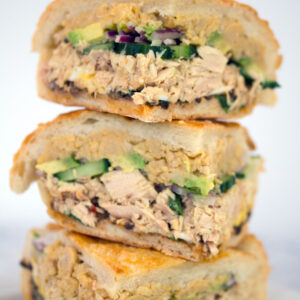 Tuna Nicoise Sandwich -- The layered sandwich includes tuna, eggs, avocado, chickpeas, and more! | wearenotmartha.com